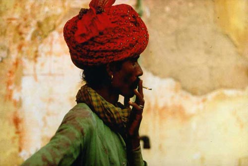"Rajastani man smoking a "bidi" indian sigarette made of ebony leafs" Puskar