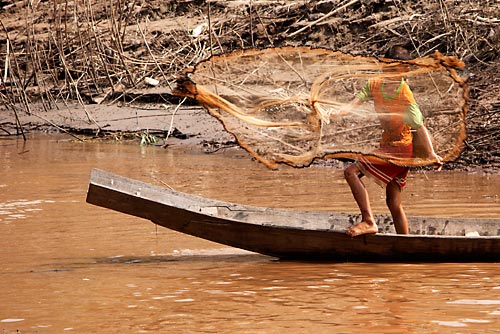 "Kid fishing on the Mekhong", Laos